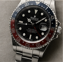 Часы Rolex с красно-синим безелем
